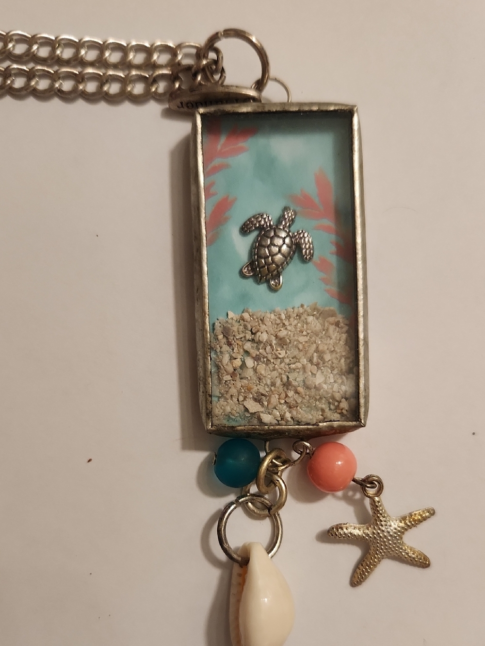 Plunder Sea Turtle Sand Pendant Necklace in Aqua and Coral